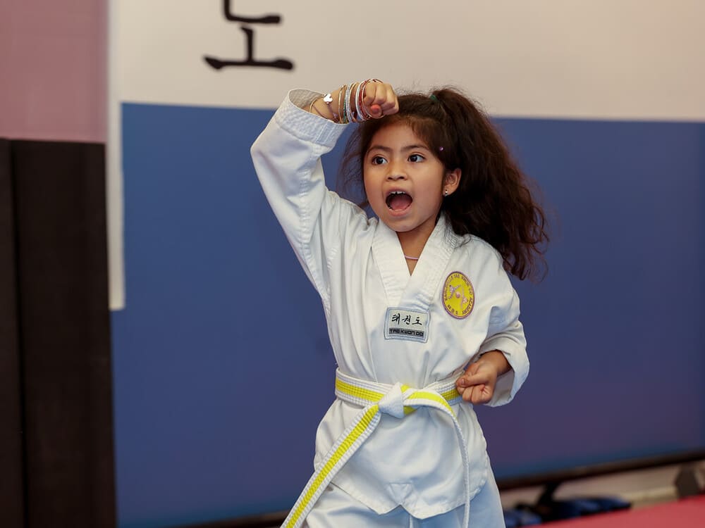 a yellow belt young kid practicing her taekwondo lesson in Norristown PA